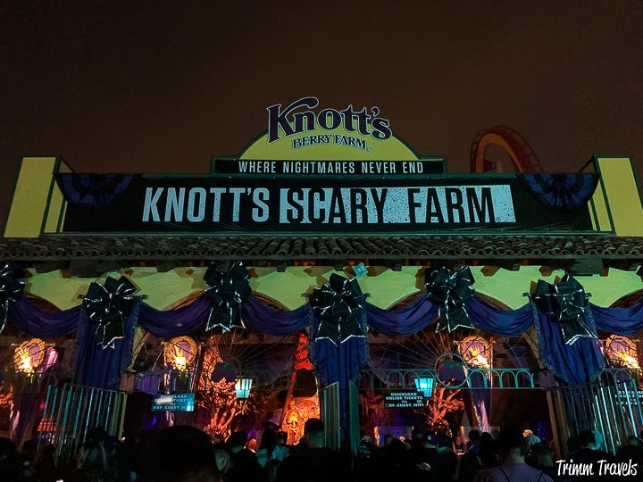 entrance to knotts scary farm in buena park california with people milling in for halloween