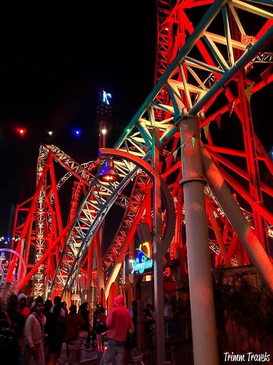 bright orange roller coaster up close during halloween at knotts scary farm in buena park california