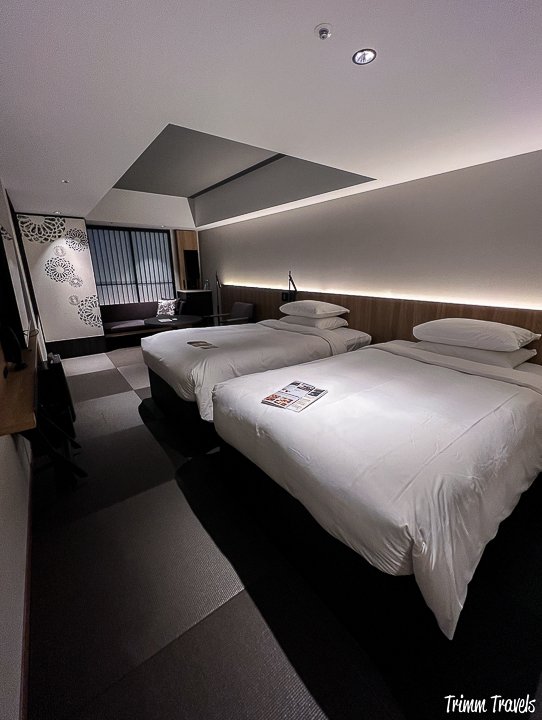 double beds in a room at the chapter kyoto hotel in kyoto japan